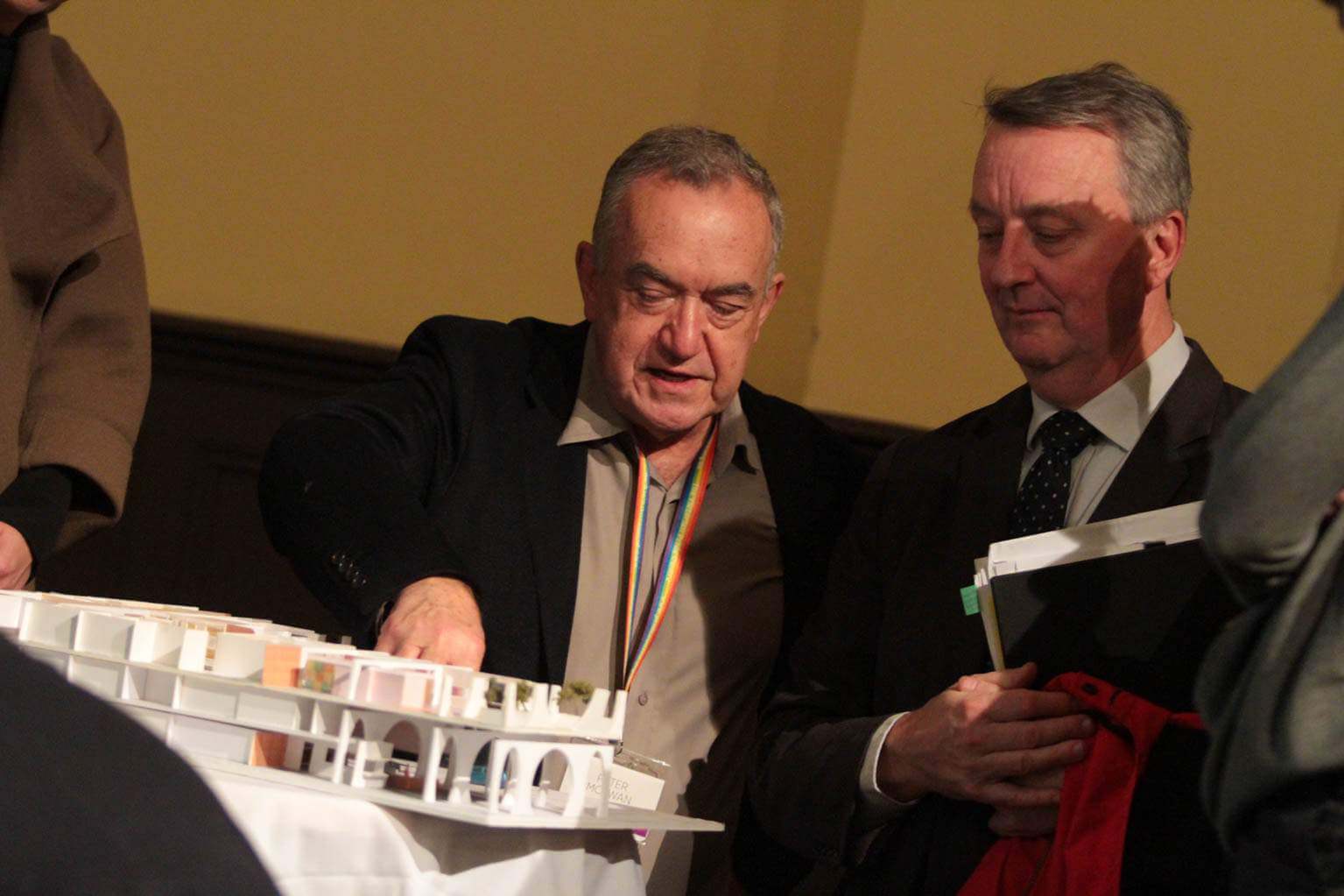Minister Foley and Peter McEwan looking at the a 3D model of the Pride Centre