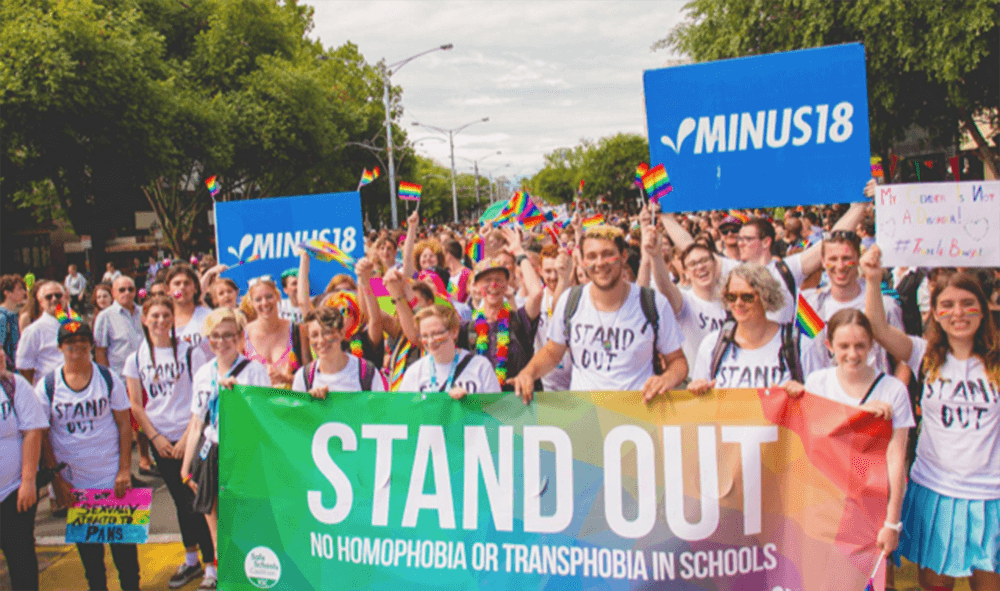 Young people gather together against homophobia