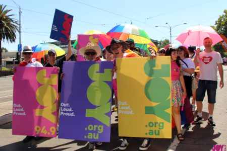 JOY Presenters and volunteers marching together at Pride March 2019