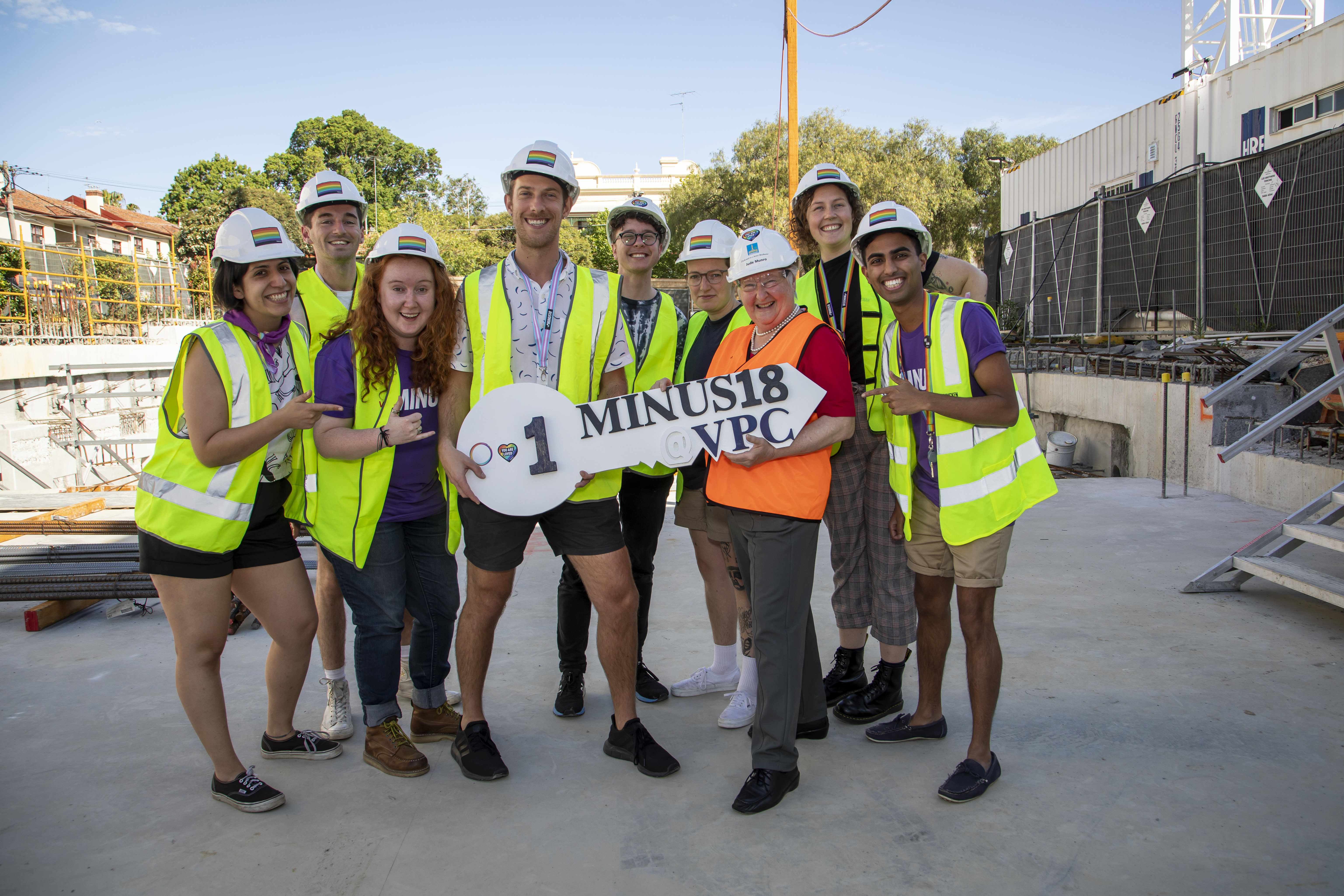 VPC Chair Jude Munro AO, Minus18 CEO Micah Scott and team mark the signing of their tenancy agreement, on the site of the Victorian Pride Centre, due to open late 2020