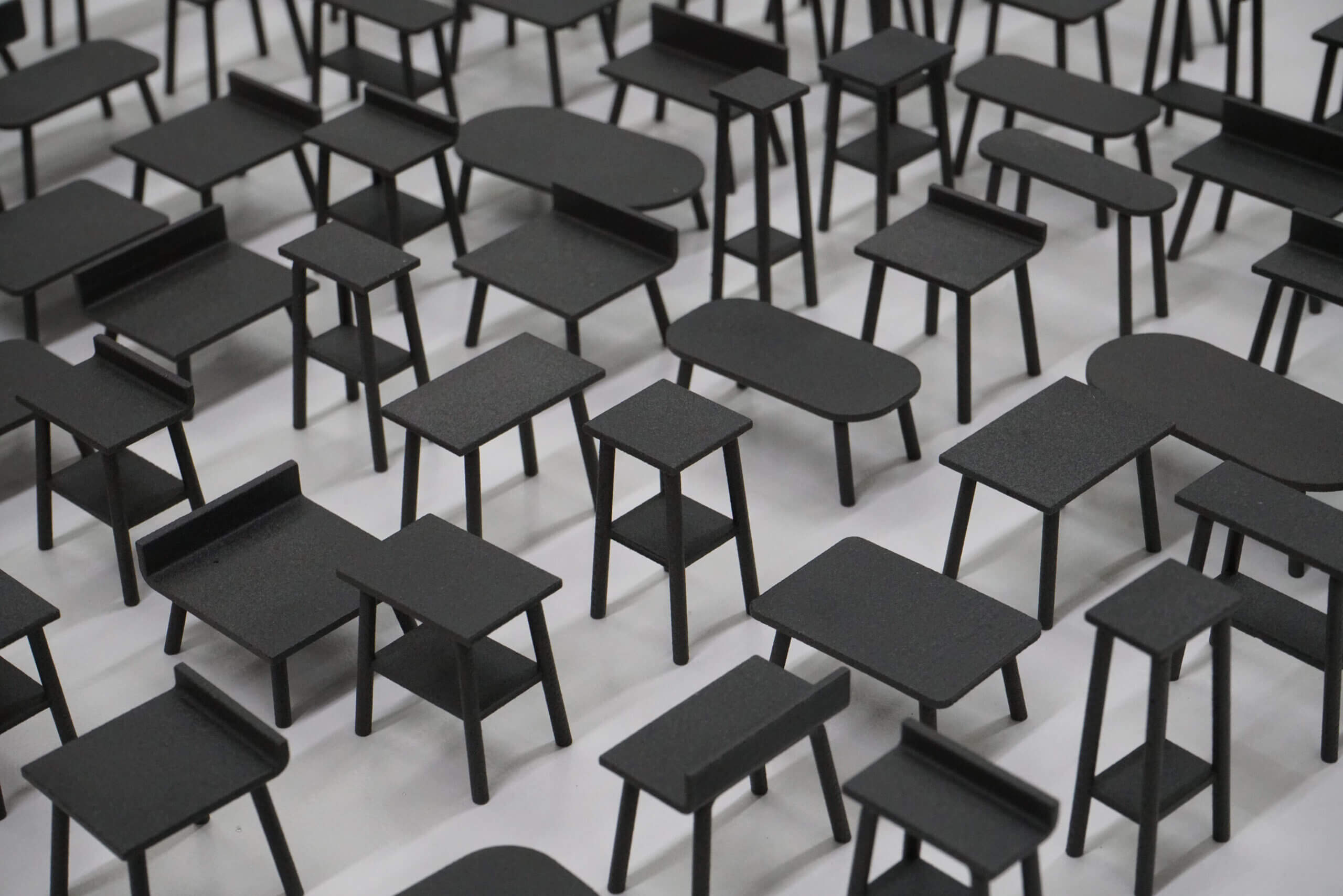 various small chairs and tables repeated exactly the same