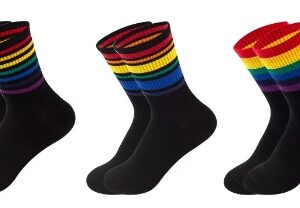 Three socks with a black base and rainbow colours at the end/top of the socks