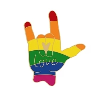 Rainbow rock hands symbol with "love" and a heart on the two middle fingers. A badge design.