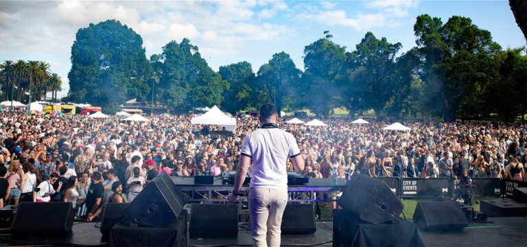 photo of a crowd at Midsumma Carnival pov behind the DJ