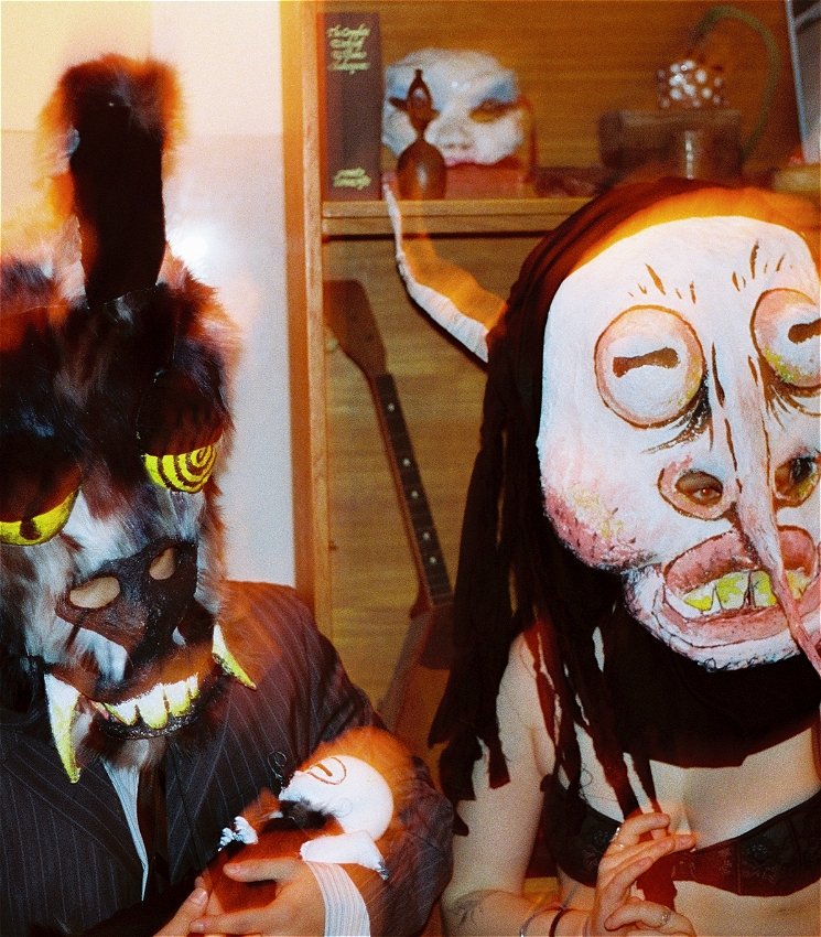 Two large theatre masks